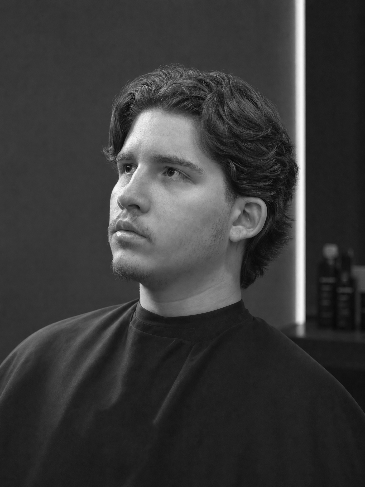 Medium-length tailored haircut with a natural textured finish